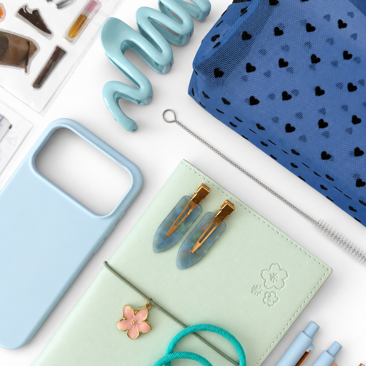 Blue Butterfly Tumbler Gift Set with light blue iPhone case and hair accessories