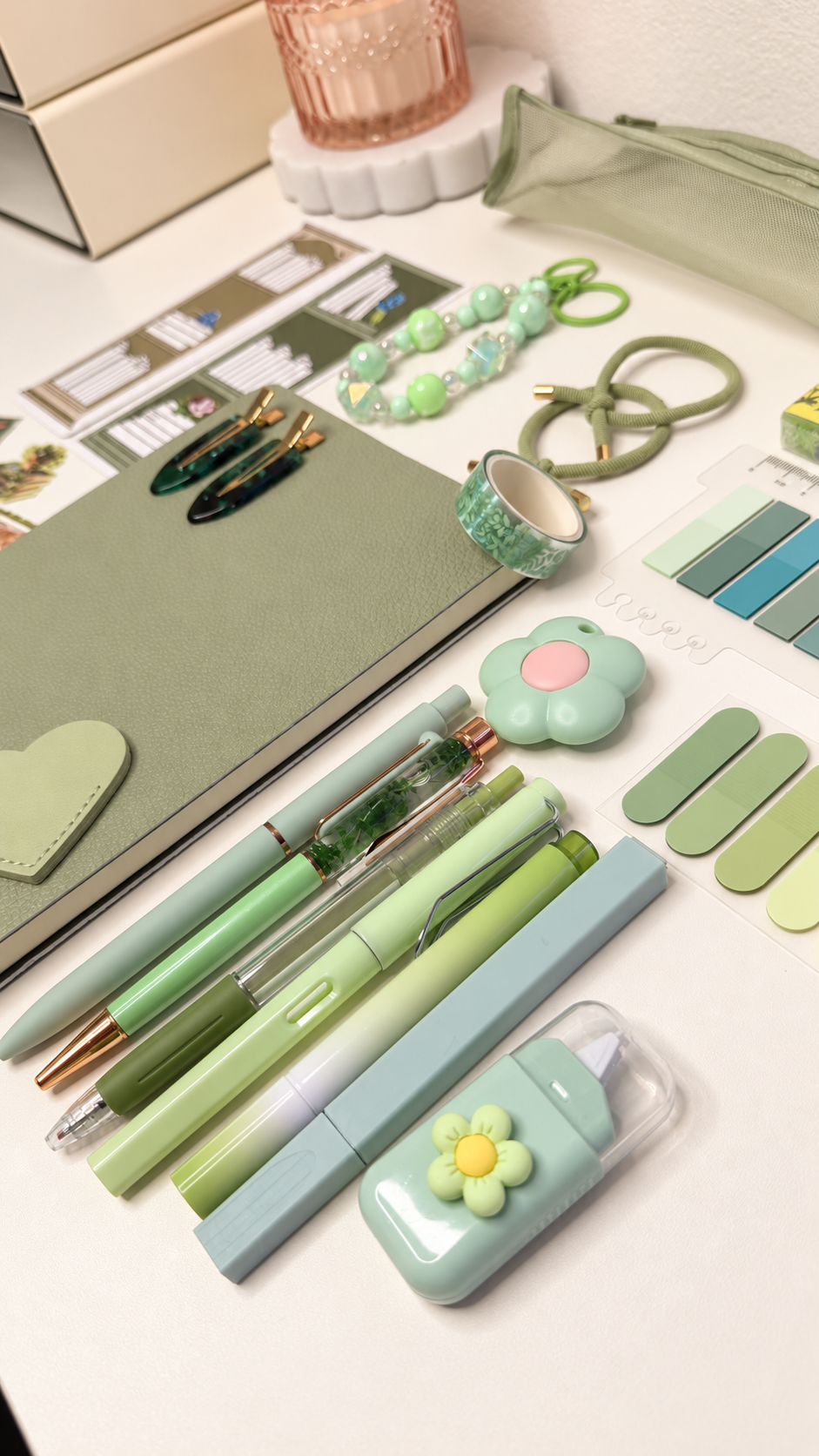 Green stationery set notebook, pens and accessories