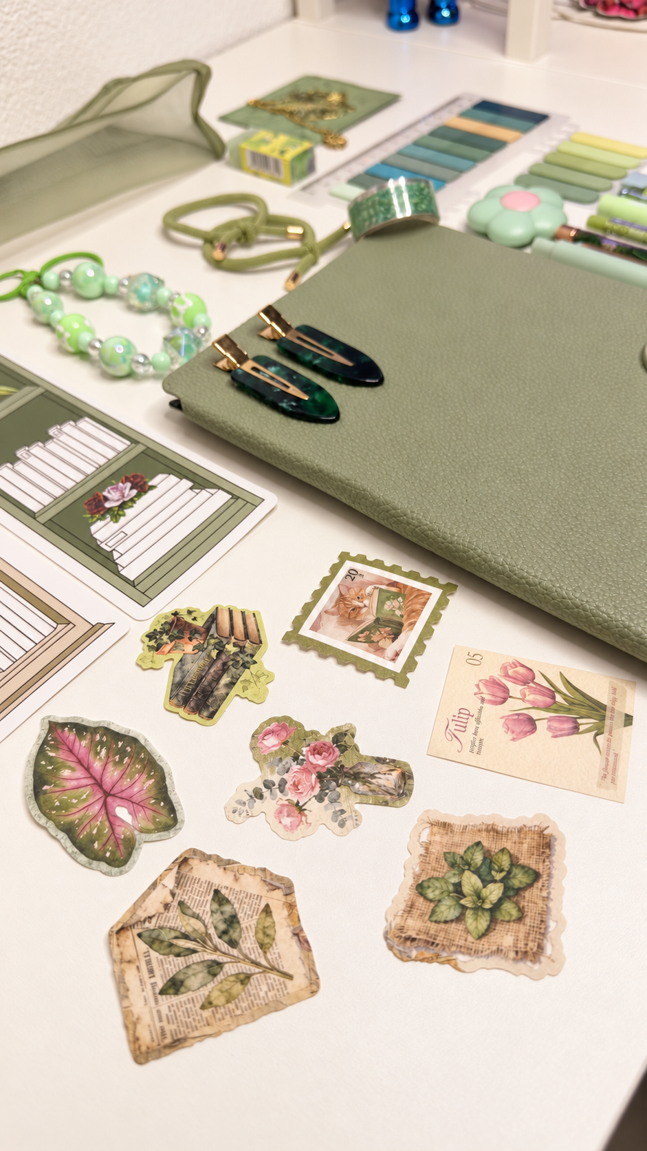 Green stationery set notebook and botanical stickers